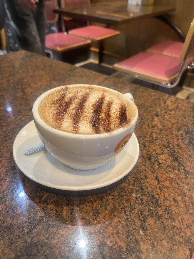 Patterned cappuccino on marble